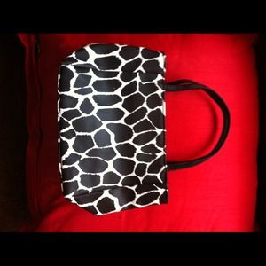 Cosmetic bag or small purse.