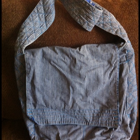 Denim over the shoulder book bag.