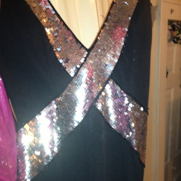 Long black dress with sequins in excellent. Shape