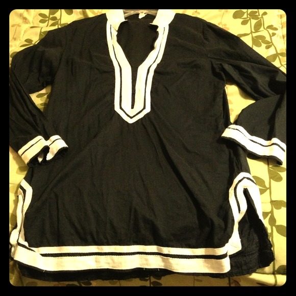 70's style shirt.