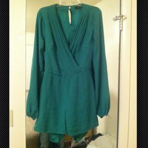 Amazing romper!! Open back! Very stylish!