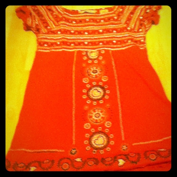 It's a very designed and detailed shirt