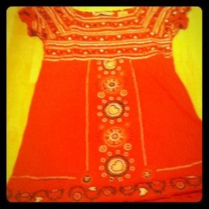 It's a very designed and detailed shirt