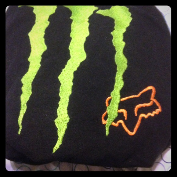 A black fox/monster shirt.