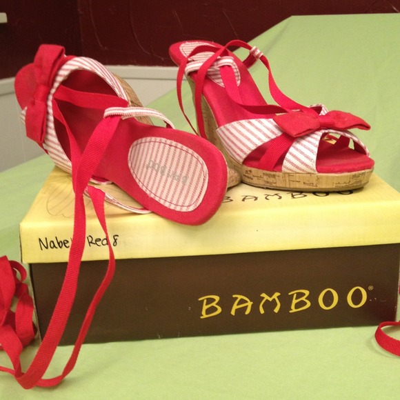 Red lace up cork wedges.
