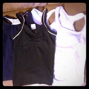 RESERVED 4 workout tanks/free yoga pants!