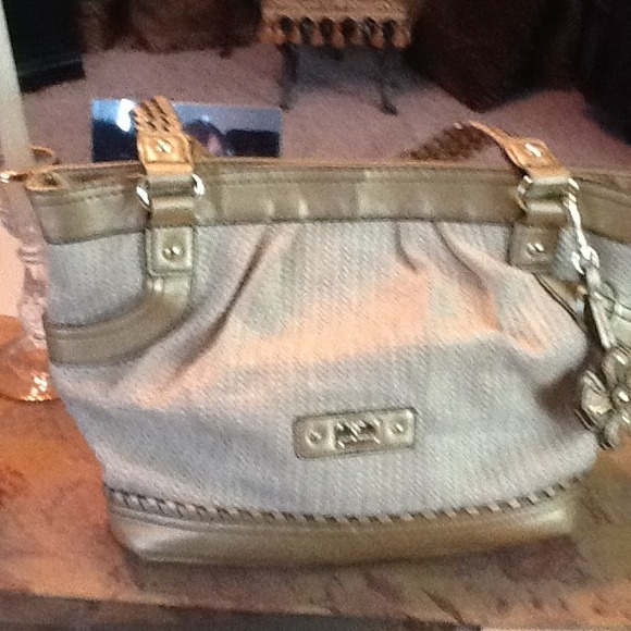 Etienne Aigner gold and tan handbag.