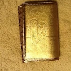 Sold!! Practically brand new Coach wallet!!