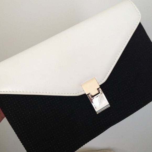 Black and white leather/suede clutch