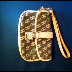 Dooney and Bourke logo flap wristlet