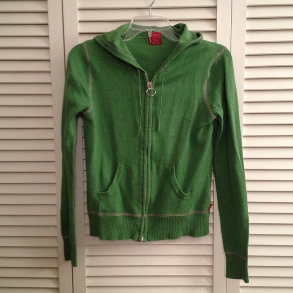 Green zippered hoody.