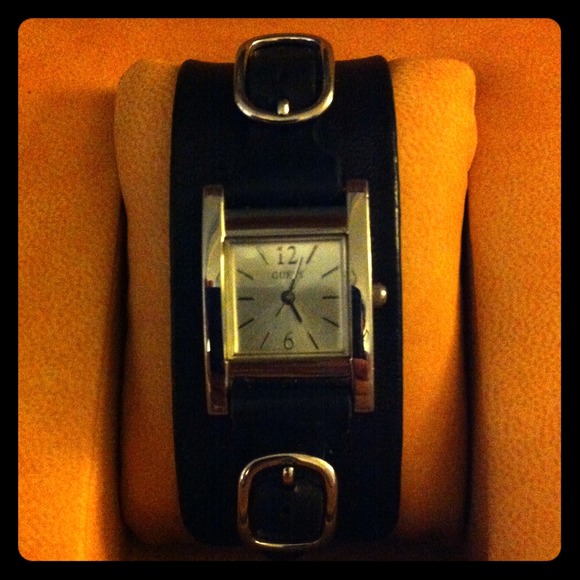 **SOLD** Guess black leather and silver-tone watch