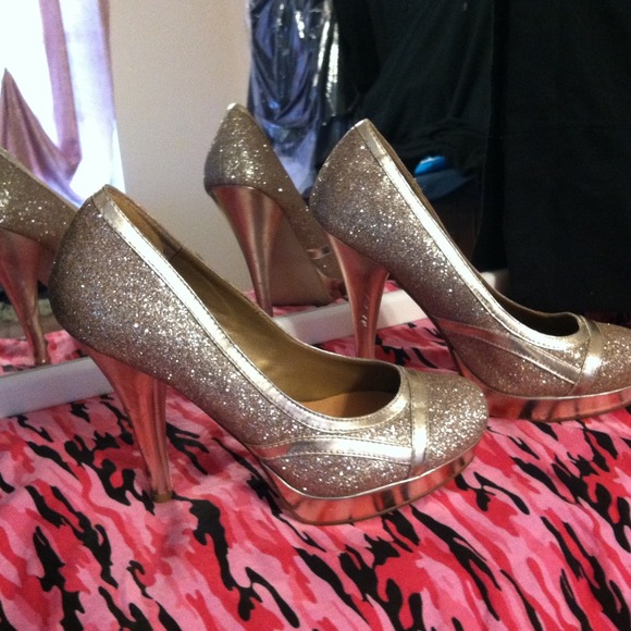Gold high heel shoes