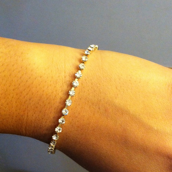 SOLDFaux gold tone diamond tennis bracelet