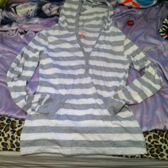Hooded gray and white striped shirt.