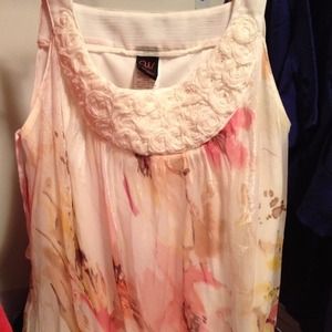 Floral print with detailed neckline.