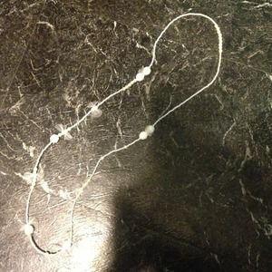 White necklace. Chic.