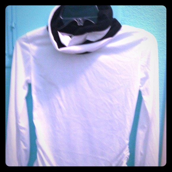 White blouse with black collar