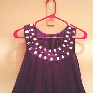 Rich violet embedded top.
