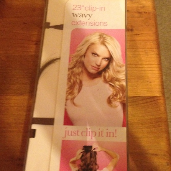 23"clip-in wavy extensions by Jessica Simpson