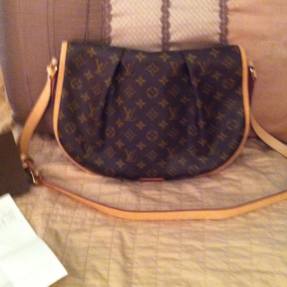 Authentic Louis Vuitton Menilmontant MM Monogram.