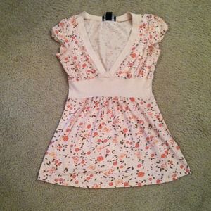 Pinkish/tanish colored top