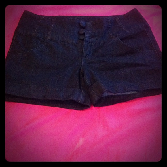 High waisted jean shorts .