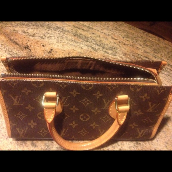 Authentic Louis Vuitton small hand bag. Brand New