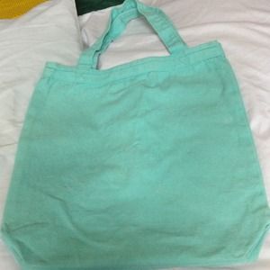 Mint/turquoise cloth carry all bag.