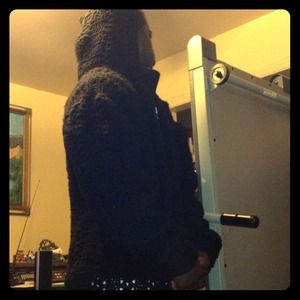 Crocheted Black belted sweater jacket with hood.