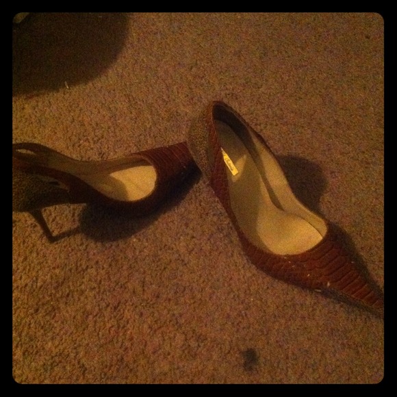 Micheal Antonio snake skin heels