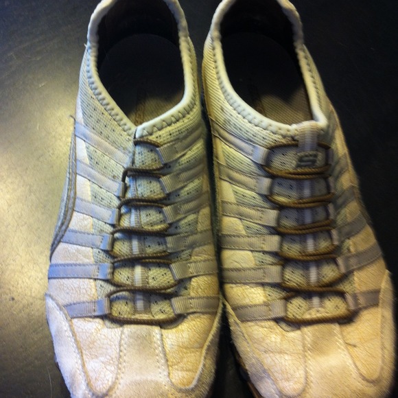 Sketchers slip on tan and dark brown sneakers