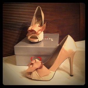 Reserved!! Beautiful nude peep toe with bow.