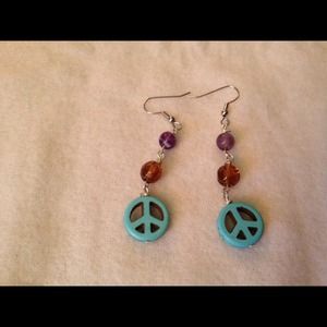 Peace hand made earrings.