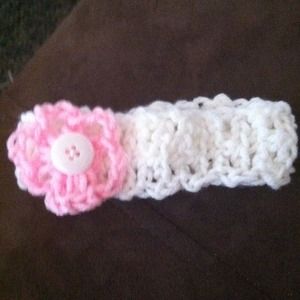 Crotcheted Headband with small open petal flower.