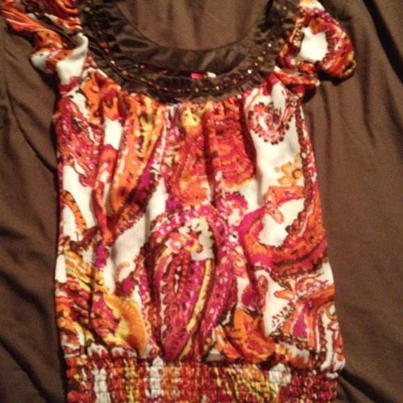 Very cute top with beaded neckline!