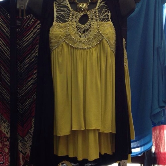 Yellow sleeveless top