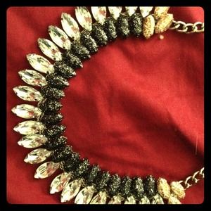 Black and gold spike the punch Rainey