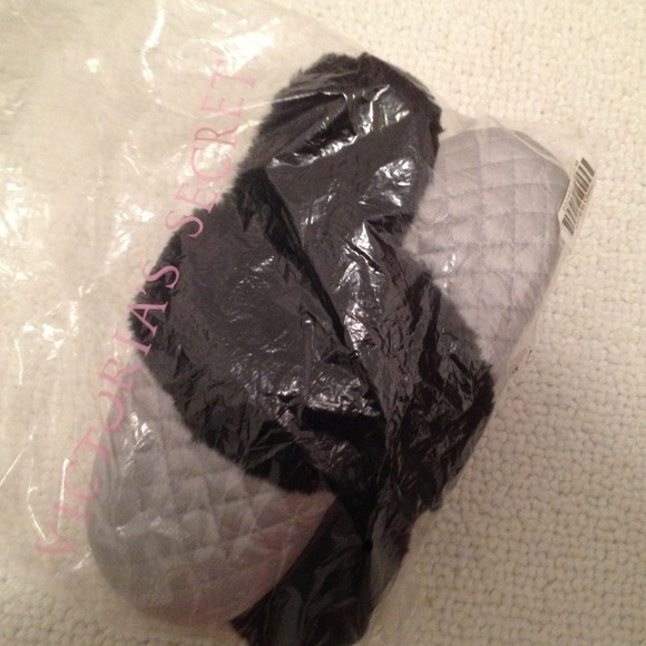 Brand new never worn slippers. Still in package.