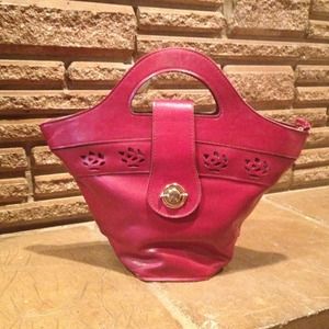 Burgundy satchel; no brand name listed.