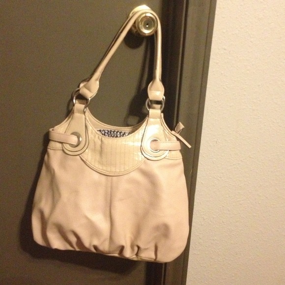 Neutral color handbag.