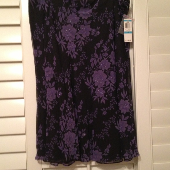 Black with purple flowers n beading.
