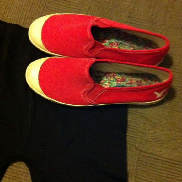 Slip-on American Eagle canvas shoes.