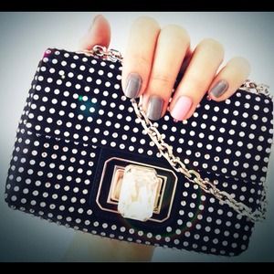 SOLD iman Judith Leiber 100% authentic