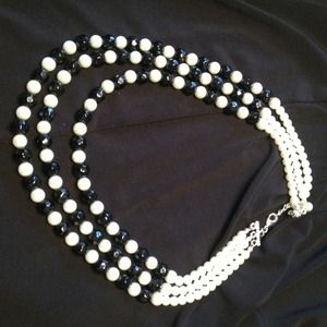 Black & White knockoff pearls. 3 strands together!