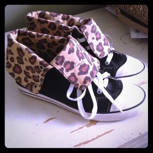 Coach high top sneakers with leopard lining