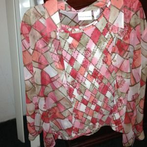 Sleeveless shirt with sheer jacket