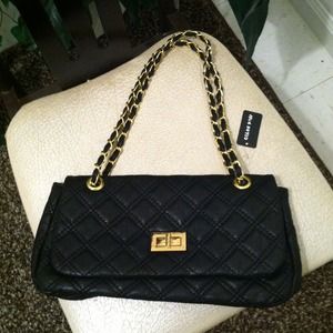 Black quilted handbag