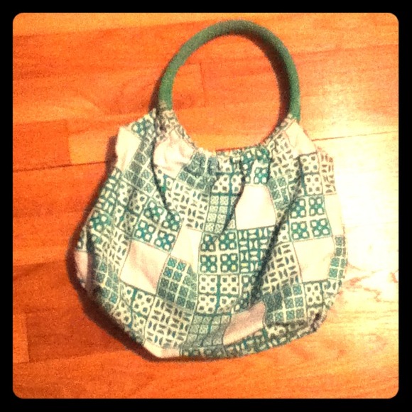 Green and white purse