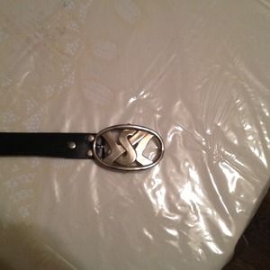 Nickle plated belt with black leather strap.